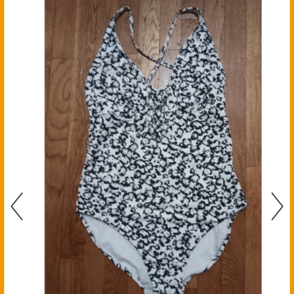 Black & White Women One-Piece Swimsuit With Cross Back.